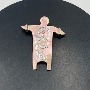 Zealandia Sterling Mother of Pearl Figural Convertible Tribal Man
Pendant/Brooch